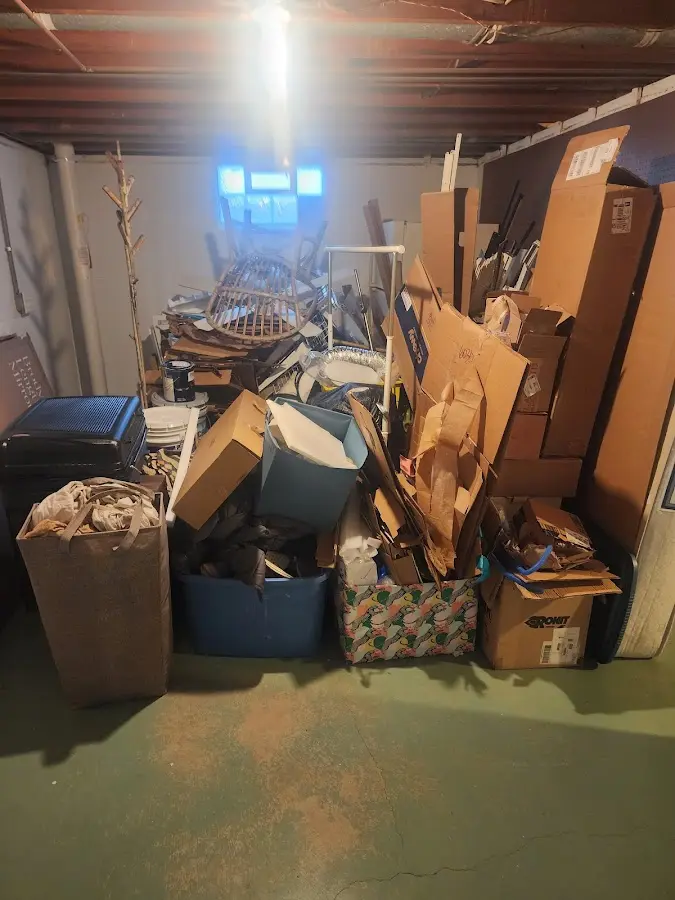 Roll-off dumpster container at job site for Yard Waste Dumpster Rental in Scituate